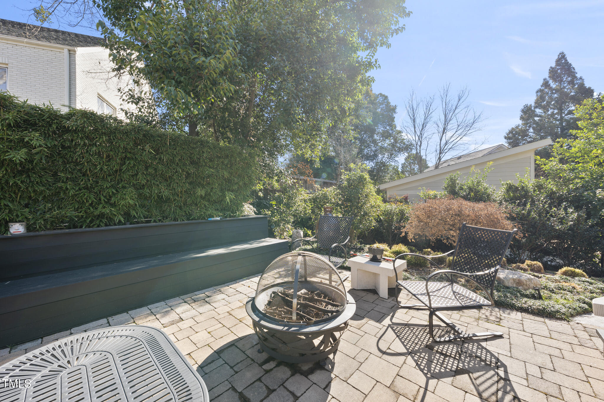920 West Johnson Street Raleigh, NC 27605 - Photo 31 of 42 a view of a backyard with furniture and a lake view