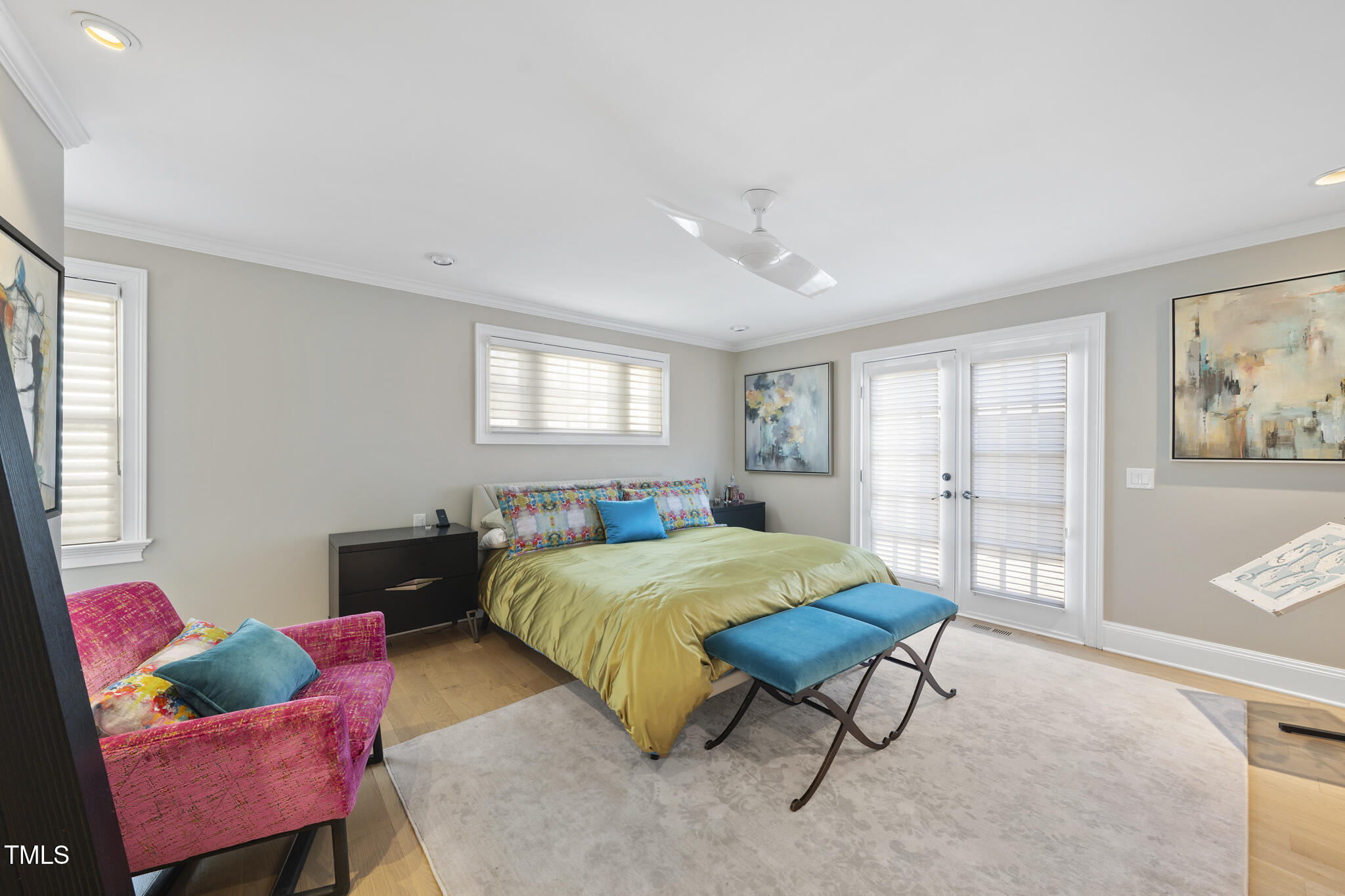 920 West Johnson Street Raleigh, NC 27605 - Photo 4 of 42 a bedroom with a bed and a couch