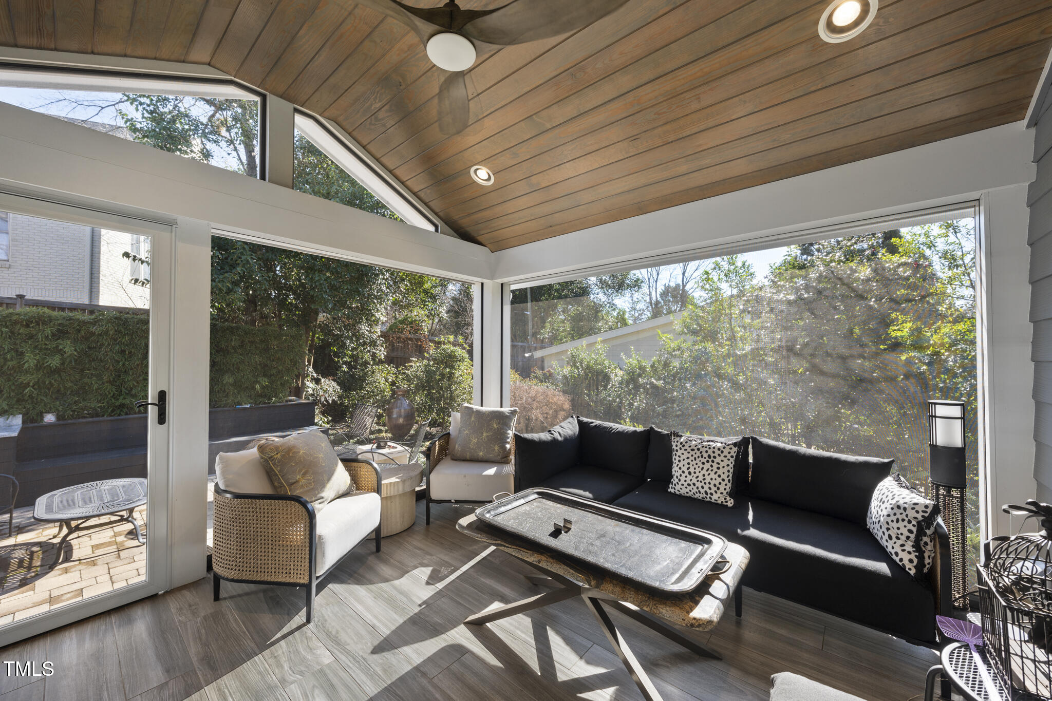 920 West Johnson Street Raleigh, NC 27605 - Photo 5 of 42 a living room with furniture and a floor to ceiling window