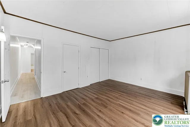 a view of small space with wooden floor