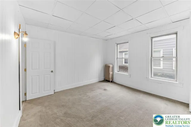 an empty room with windows