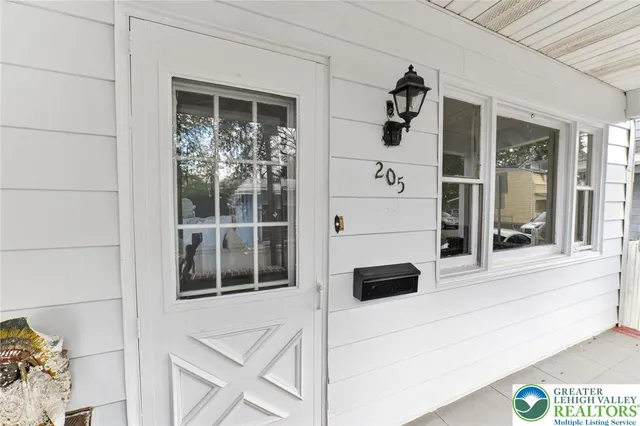 a view of front door and porch