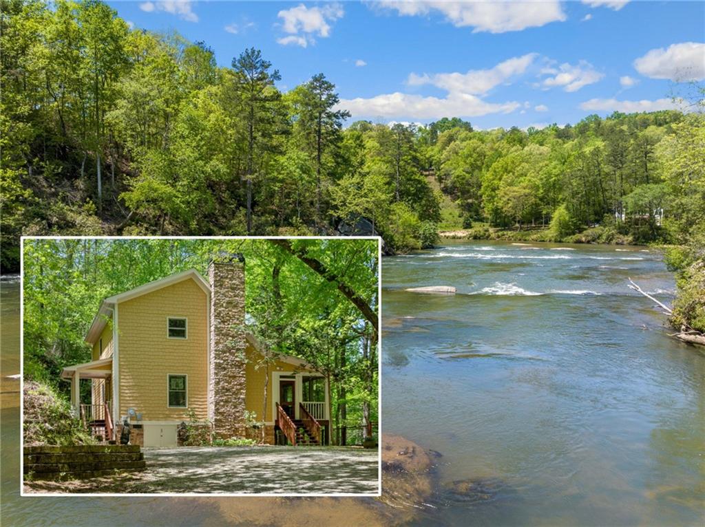 1680 Heads Ferry Road Cornelia, GA 30531 - Photo 1 of 1 a view of a house with a floor to ceiling window and yard