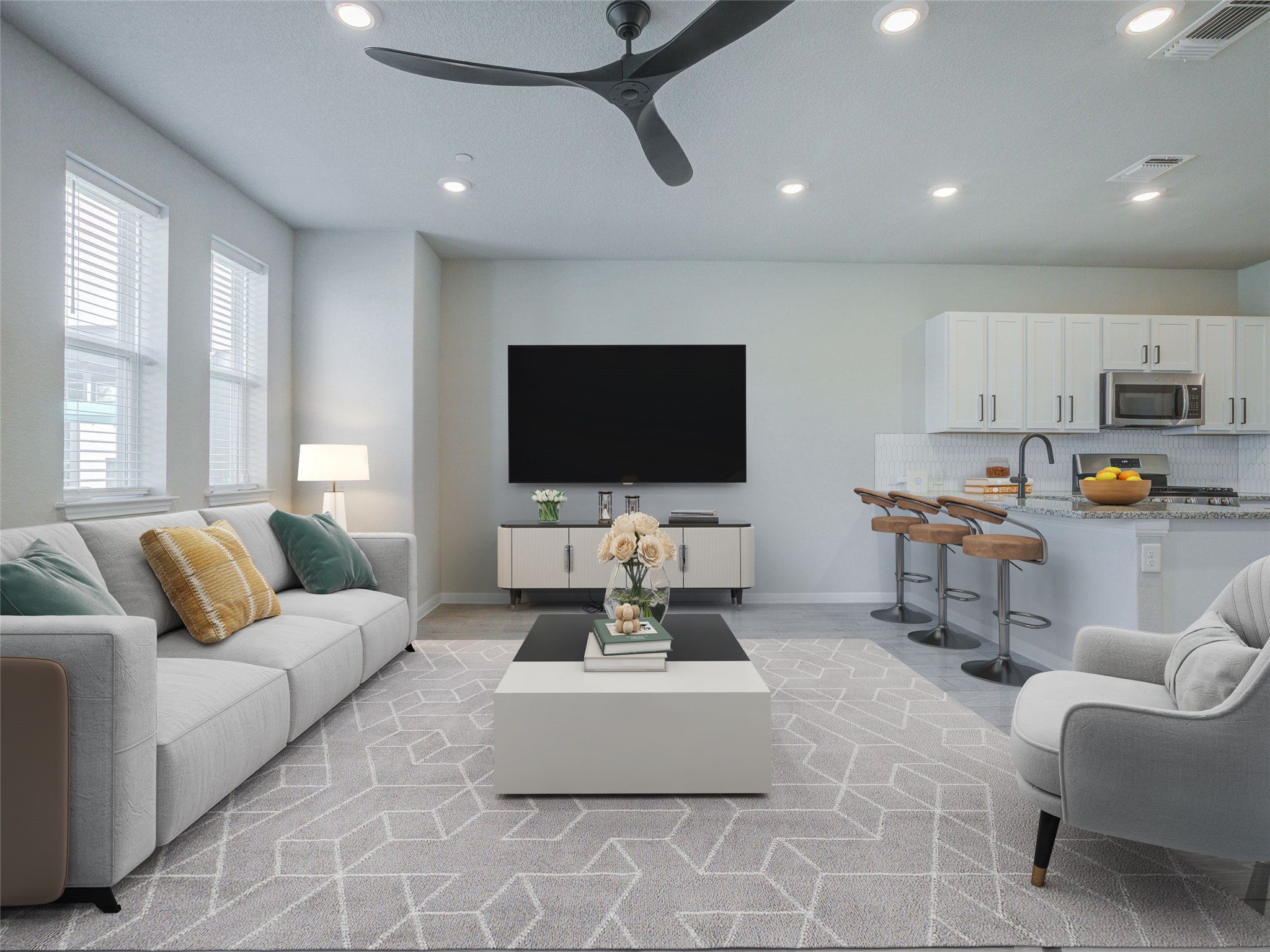 a living room with furniture and a flat screen tv