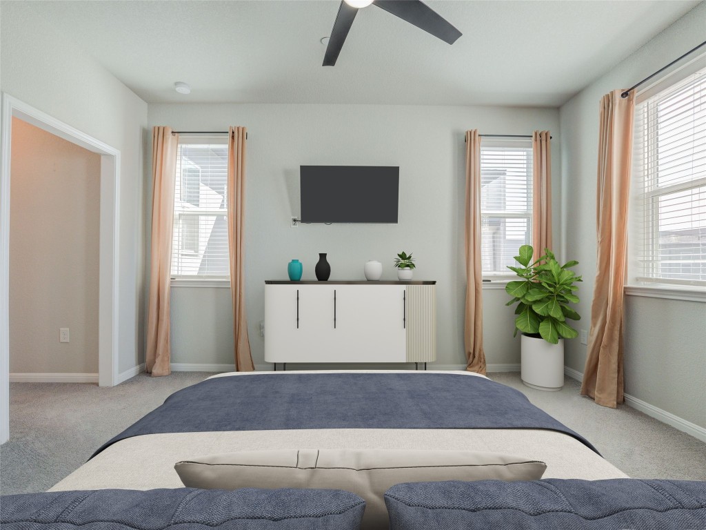 9015 Cattle Baron Path, Unit 502 Austin, TX 78747 - Photo 12 of 40 a living room with a potted plant