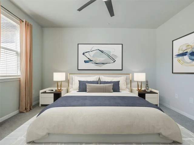 a bathroom with a double vanity sink mirror and next to a window