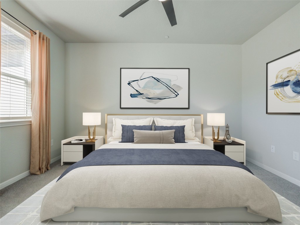 9015 Cattle Baron Path, Unit 502 Austin, TX 78747 - Photo 13 of 40 a bedroom with a bed and a chandelier