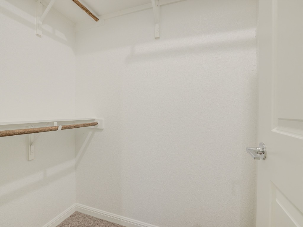 9015 Cattle Baron Path, Unit 502 Austin, TX 78747 - Photo 20 of 40 a view of small space with racks on the wall