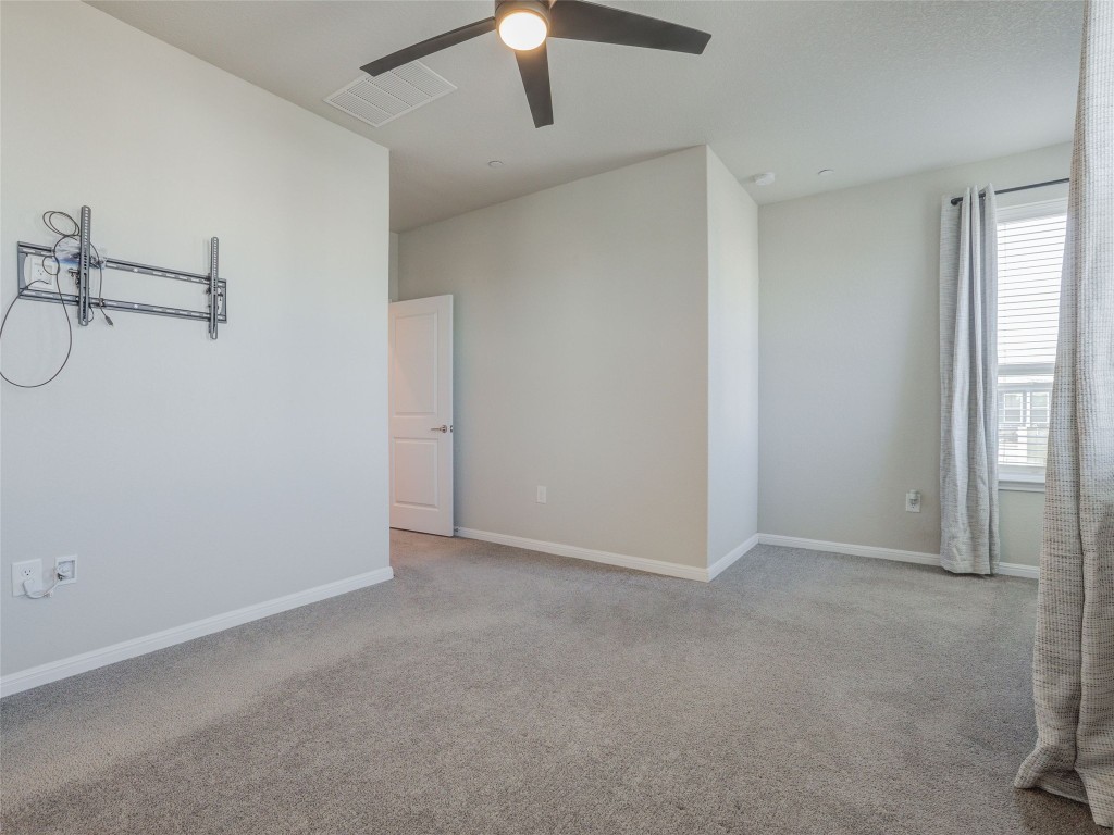 9015 Cattle Baron Path, Unit 502 Austin, TX 78747 - Photo 23 of 40 a view of an empty room