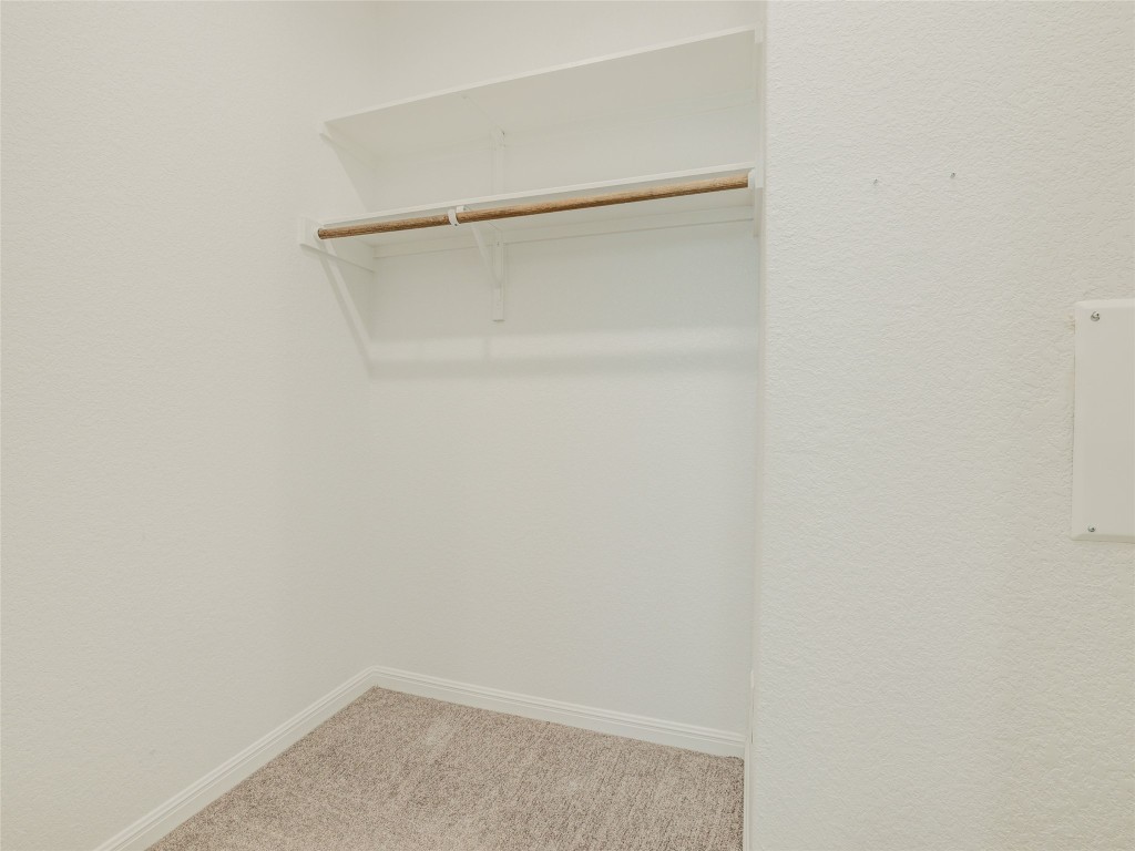 9015 Cattle Baron Path, Unit 502 Austin, TX 78747 - Photo 27 of 40 Spacious closet with light carpet