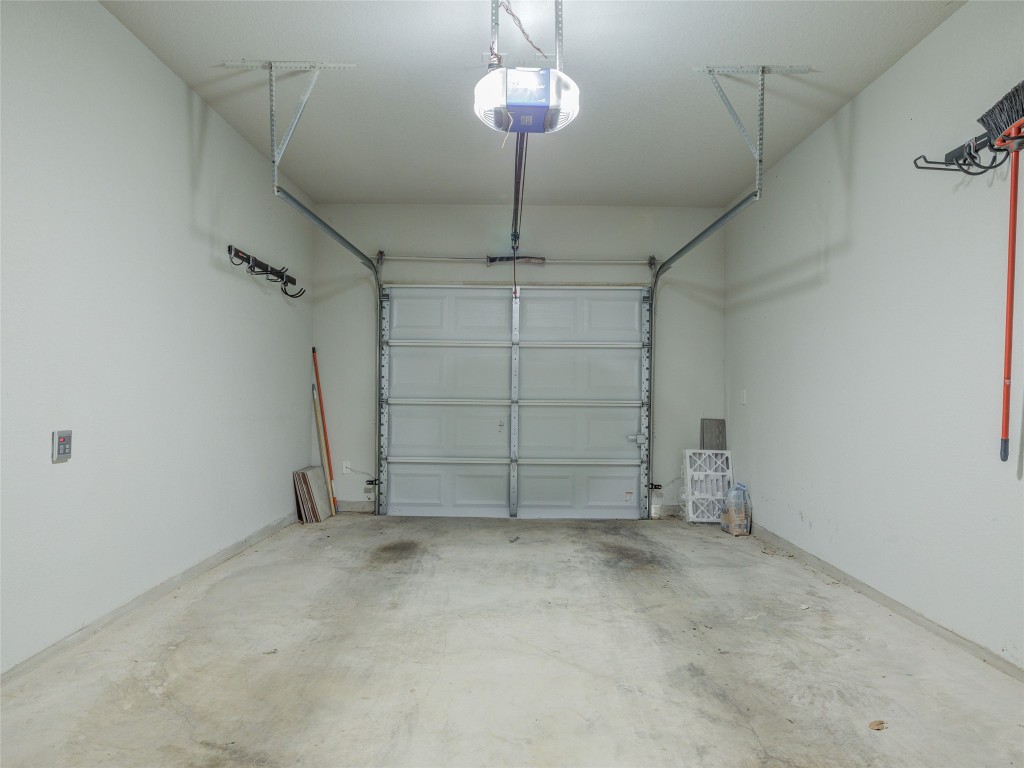 9015 Cattle Baron Path, Unit 502 Austin, TX 78747 - Photo 37 of 40 a view of a garage