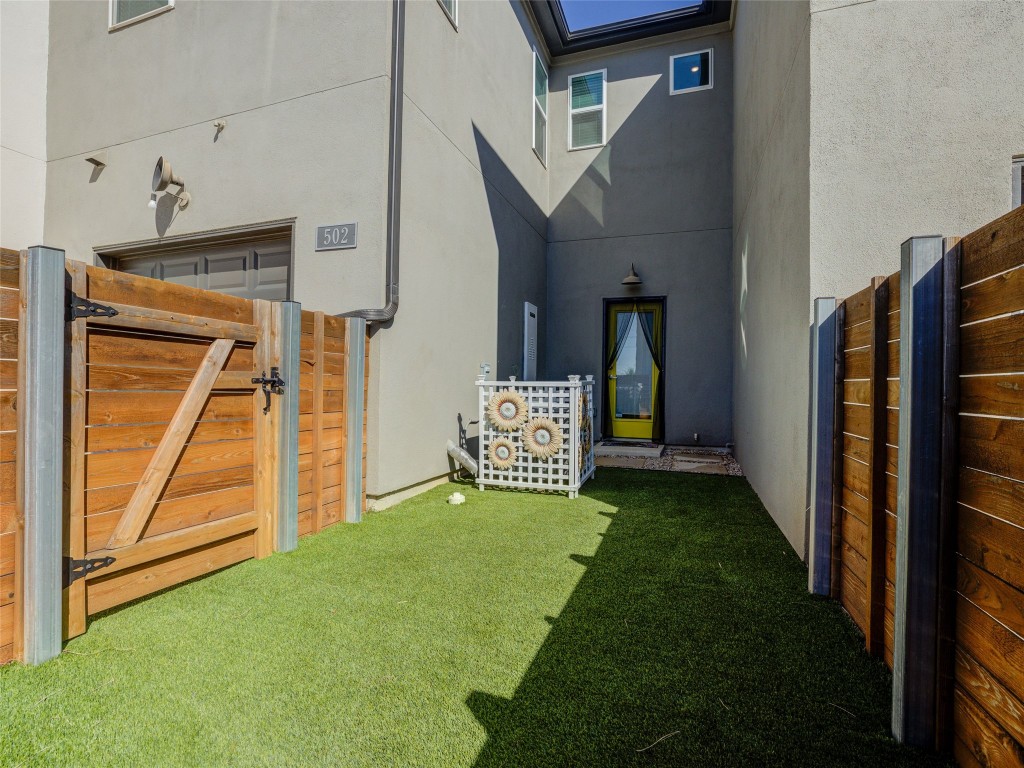 9015 Cattle Baron Path, Unit 502 Austin, TX 78747 - Photo 38 of 40 a view of a front door and porch