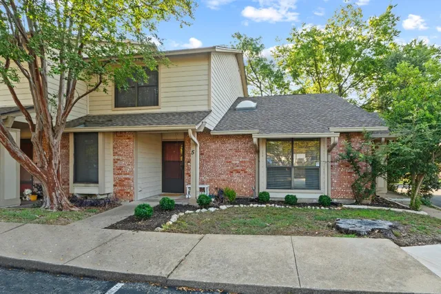 front view of a house and a yard