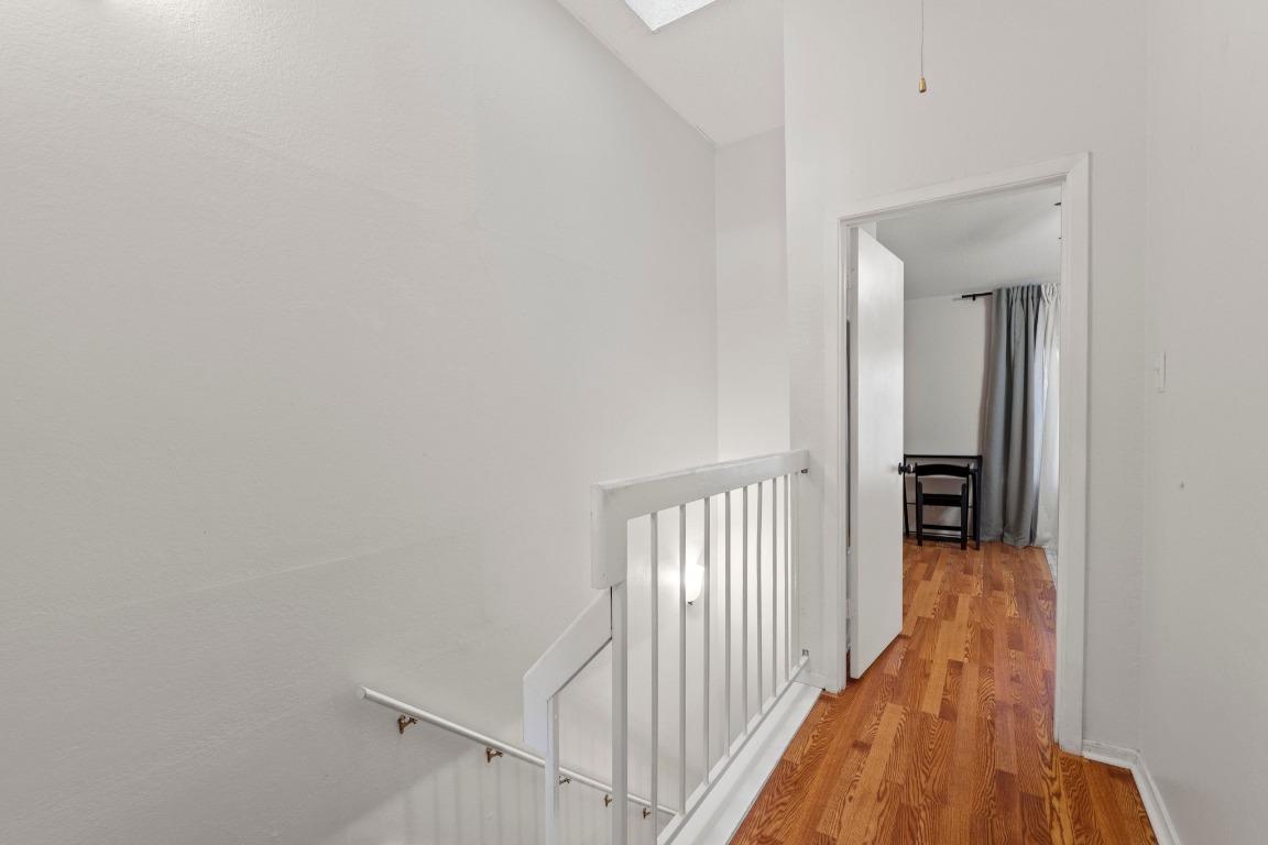 3801 Menchaca Road, Unit 5 Austin, TX 78704 - Photo 18 of 40 a view of a hallway with wooden floor and entryway
