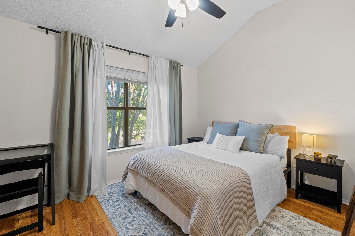 3801 Menchaca Road, Unit 5 Austin, TX 78704 - Photo 23 of 40 a bedroom with a bed and a window