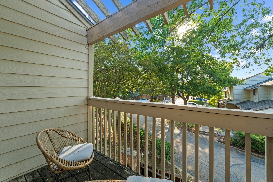 3801 Menchaca Road, Unit 5 Austin, TX 78704 - Photo 28 of 40 a view of a chair in wooden deck