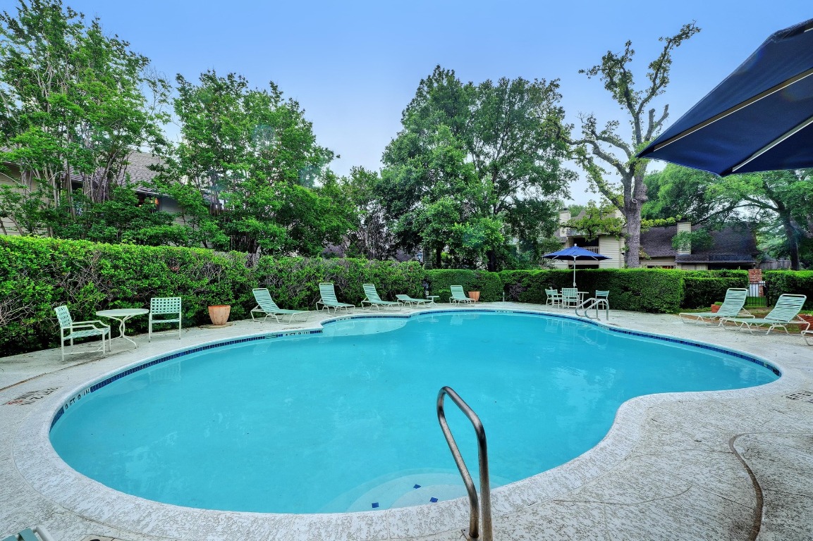 3801 Menchaca Road, Unit 5 Austin, TX 78704 - Photo 38 of 40 a view of a swimming pool with a patio