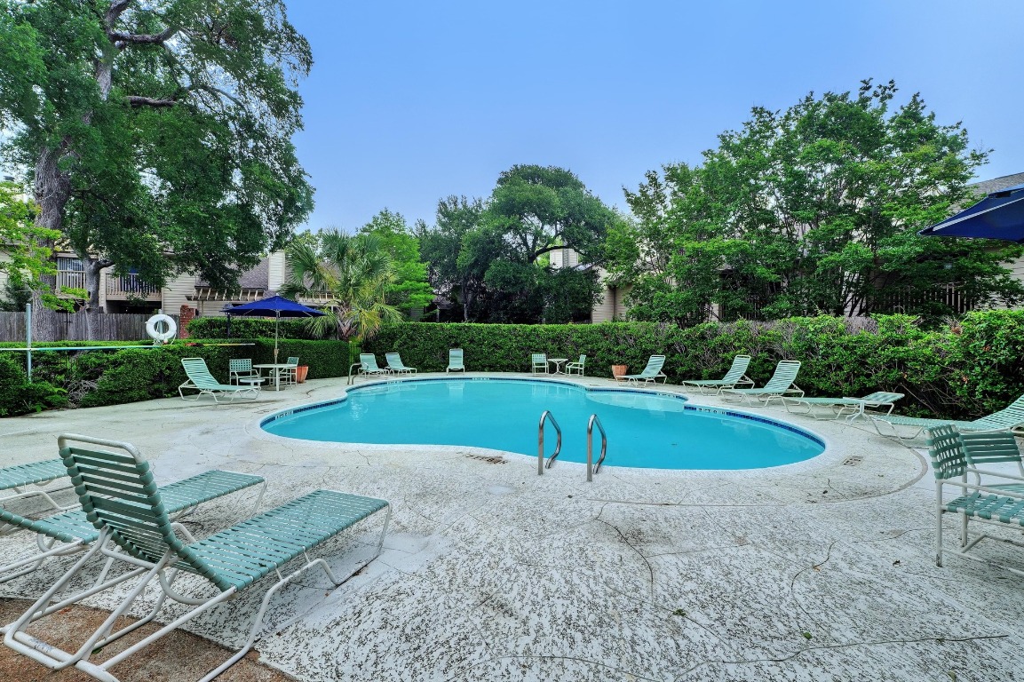 3801 Menchaca Road, Unit 5 Austin, TX 78704 - Photo 39 of 40 a view of a swimming pool with a patio