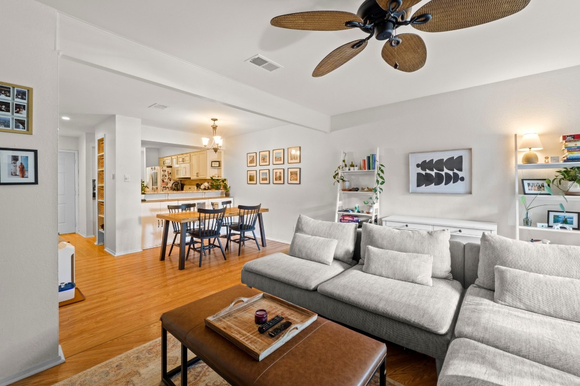 3801 Menchaca Road, Unit 5 Austin, TX 78704 - Photo 10 of 40 a living room with furniture kitchen view and a large window
