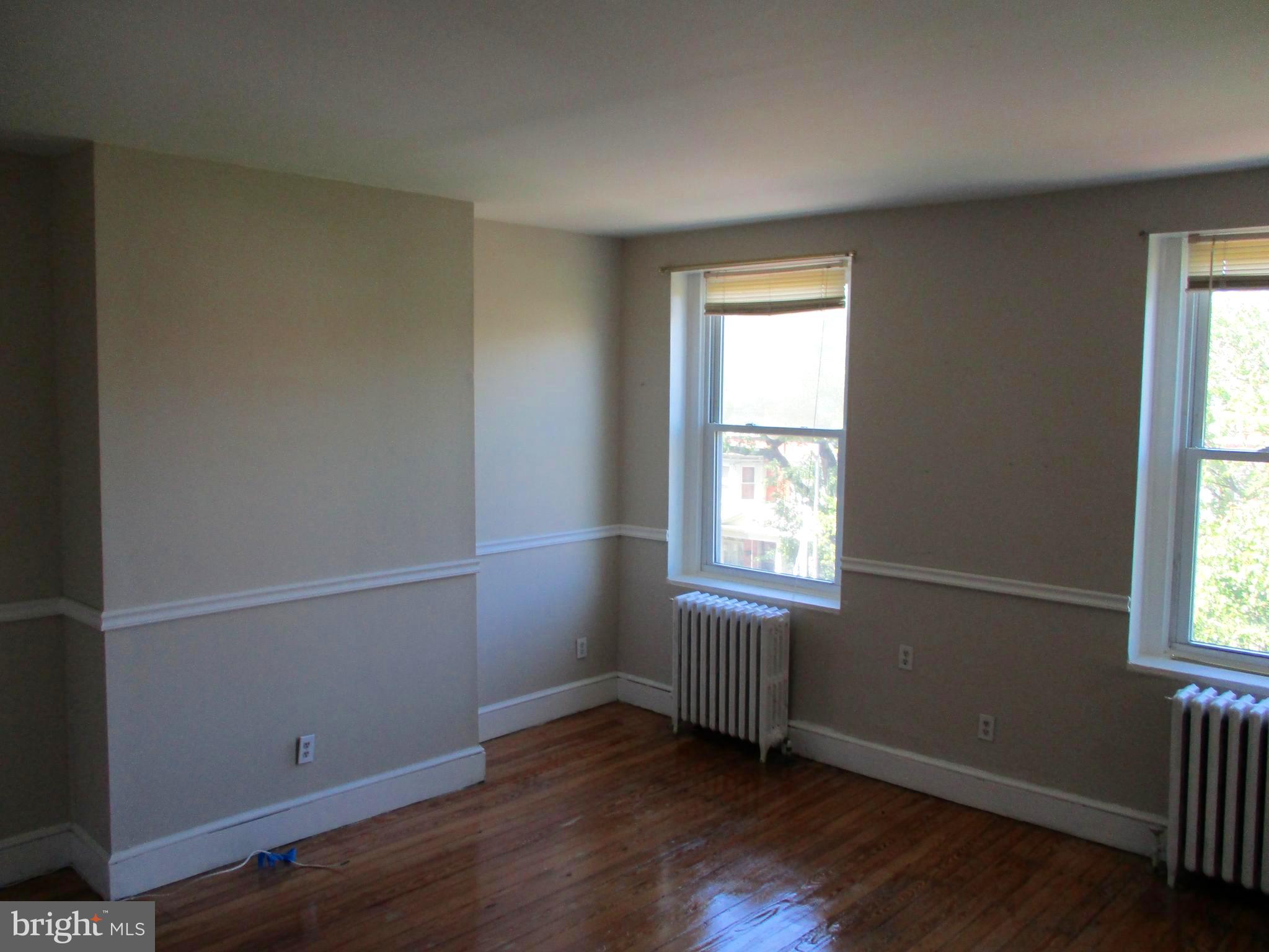 2615 North Calvert Street, Unit 3 Baltimore, MD 21218 - Photo 6 of 15 Living /Dining area Picture 3