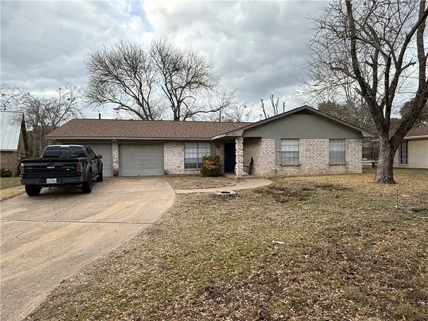 a house view with a garden space