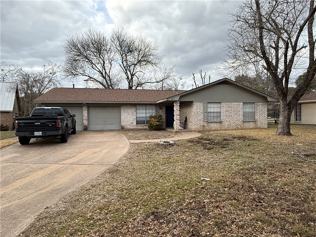 a house view with a garden space