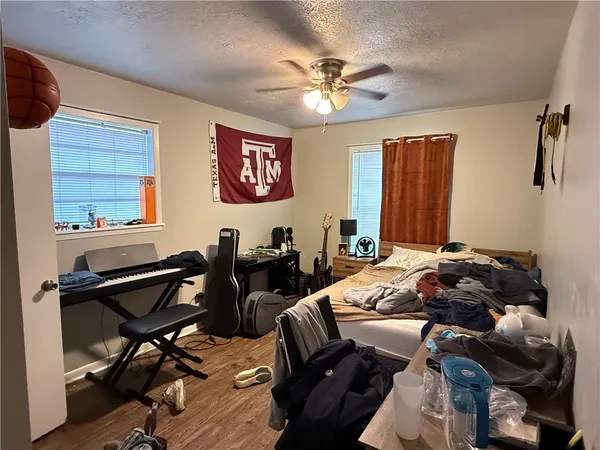 a bed room with a bed and furniture