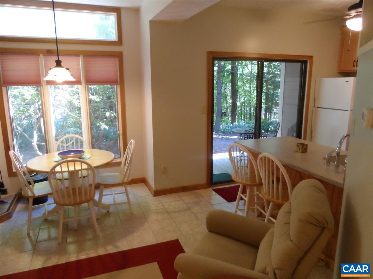 452 Three Ridges, Unit 452 Roseland, VA 22967 - Photo 9 of 28 a living room with furniture and a large window