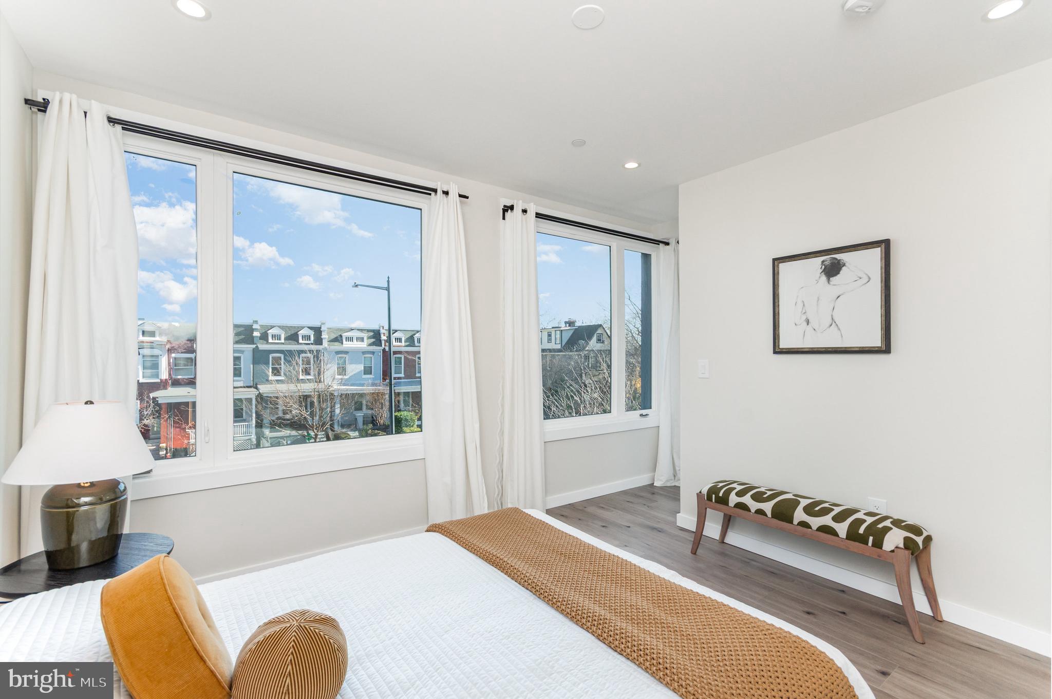 2116 4th Street Northeast, Unit B Washington, DC 20002 - Photo 17 of 28 a bedroom with furniture and a window