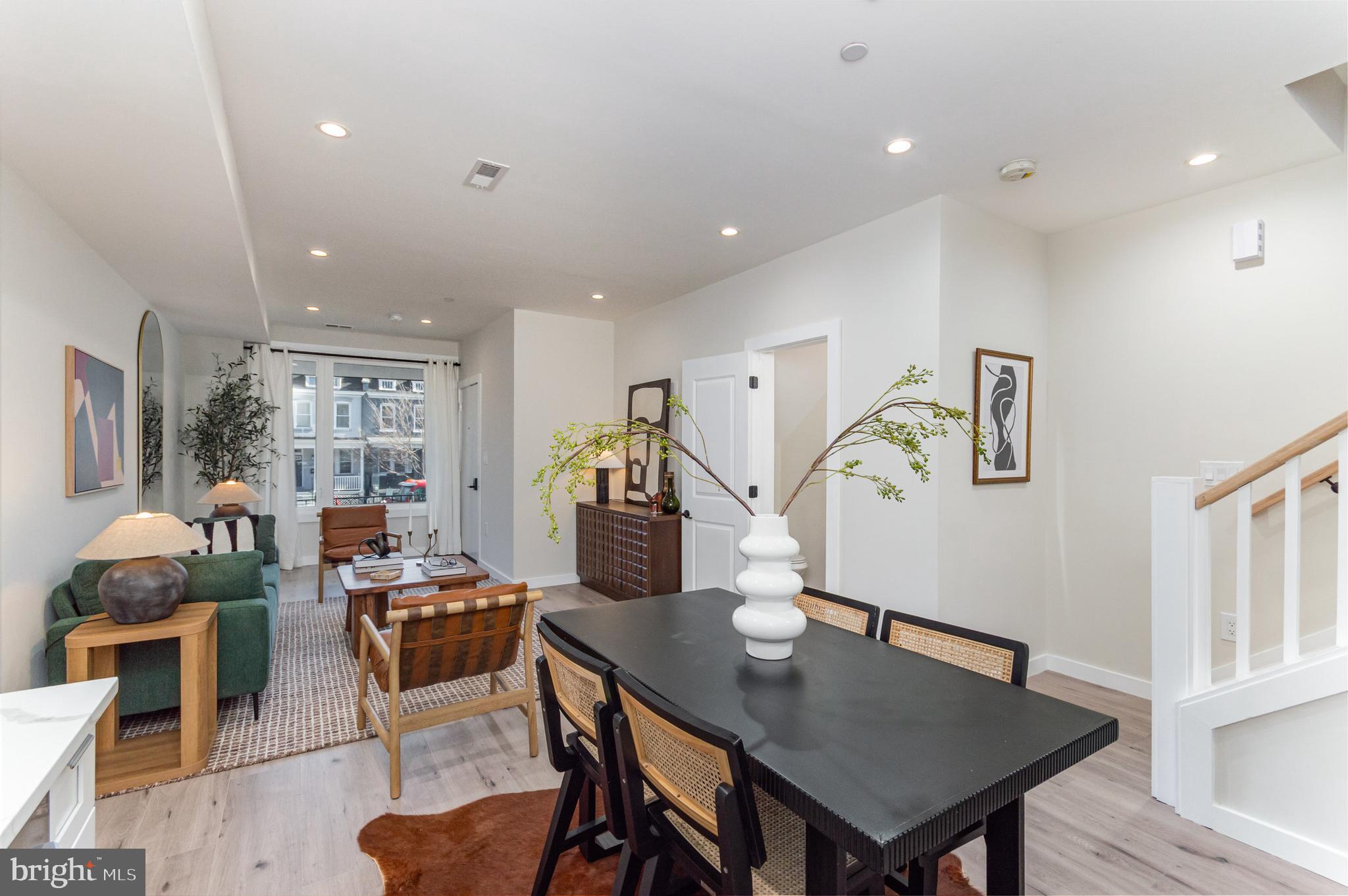2116 4th Street Northeast, Unit B Washington, DC 20002 - Photo 6 of 28 a view of a dining room with furniture and wooden floor