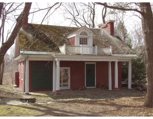 8 Sandy Pond Road Lincoln, MA 01773 - Photo 1 of 3 a view of a house with a yard and large tree