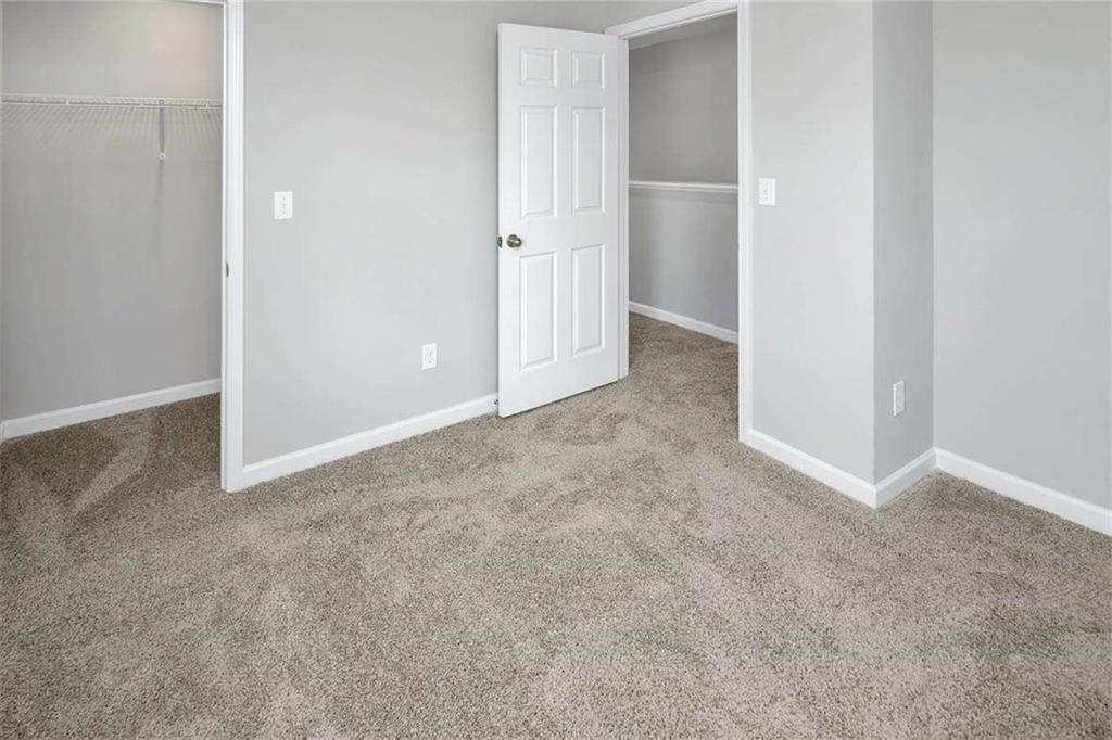 197 Lauritsen Way Newnan, GA 30265 - Photo 23 of 33 an empty room with closet area