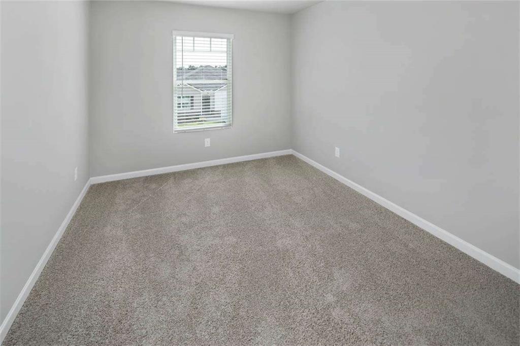 197 Lauritsen Way Newnan, GA 30265 - Photo 24 of 33 an empty room with a window