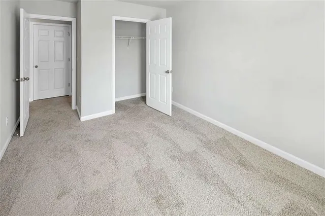 an empty room with a hallway
