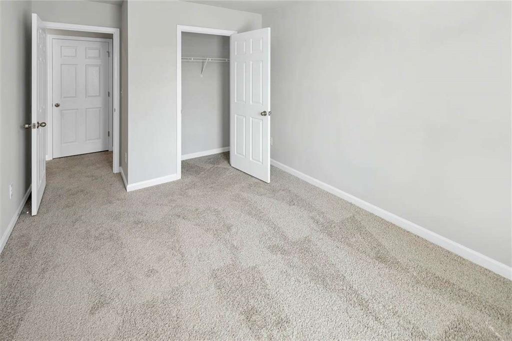 197 Lauritsen Way Newnan, GA 30265 - Photo 28 of 33 a view of an empty room and closet area