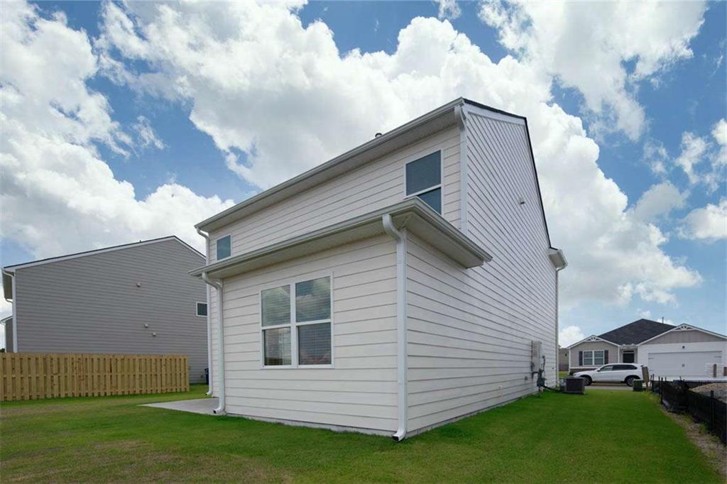 197 Lauritsen Way Newnan, GA 30265 - Photo 32 of 33 a view of a house with a yard