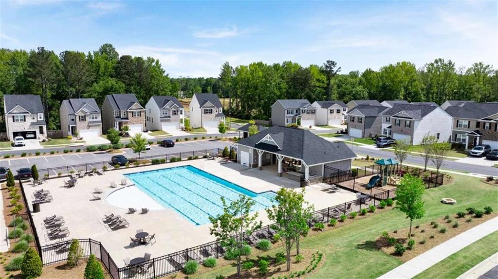 197 Lauritsen Way Newnan, GA 30265 - Photo 9 of 33 an aerial view of a house with swimming pool garden and patio