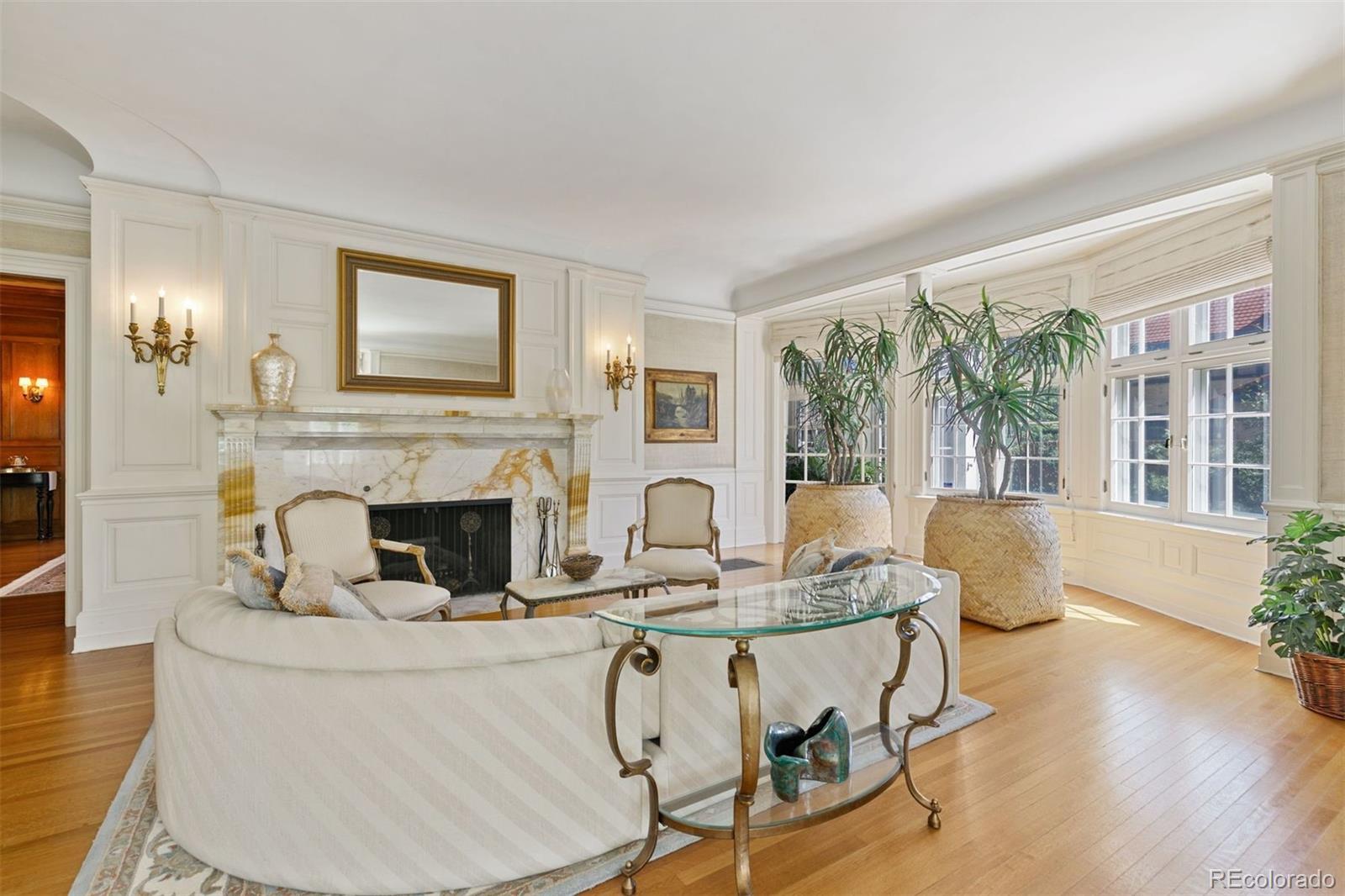 1415 North Cascade Avenue Colorado Springs, CO 80907 - Photo 12 of 48 a living room with fireplace furniture and a large window