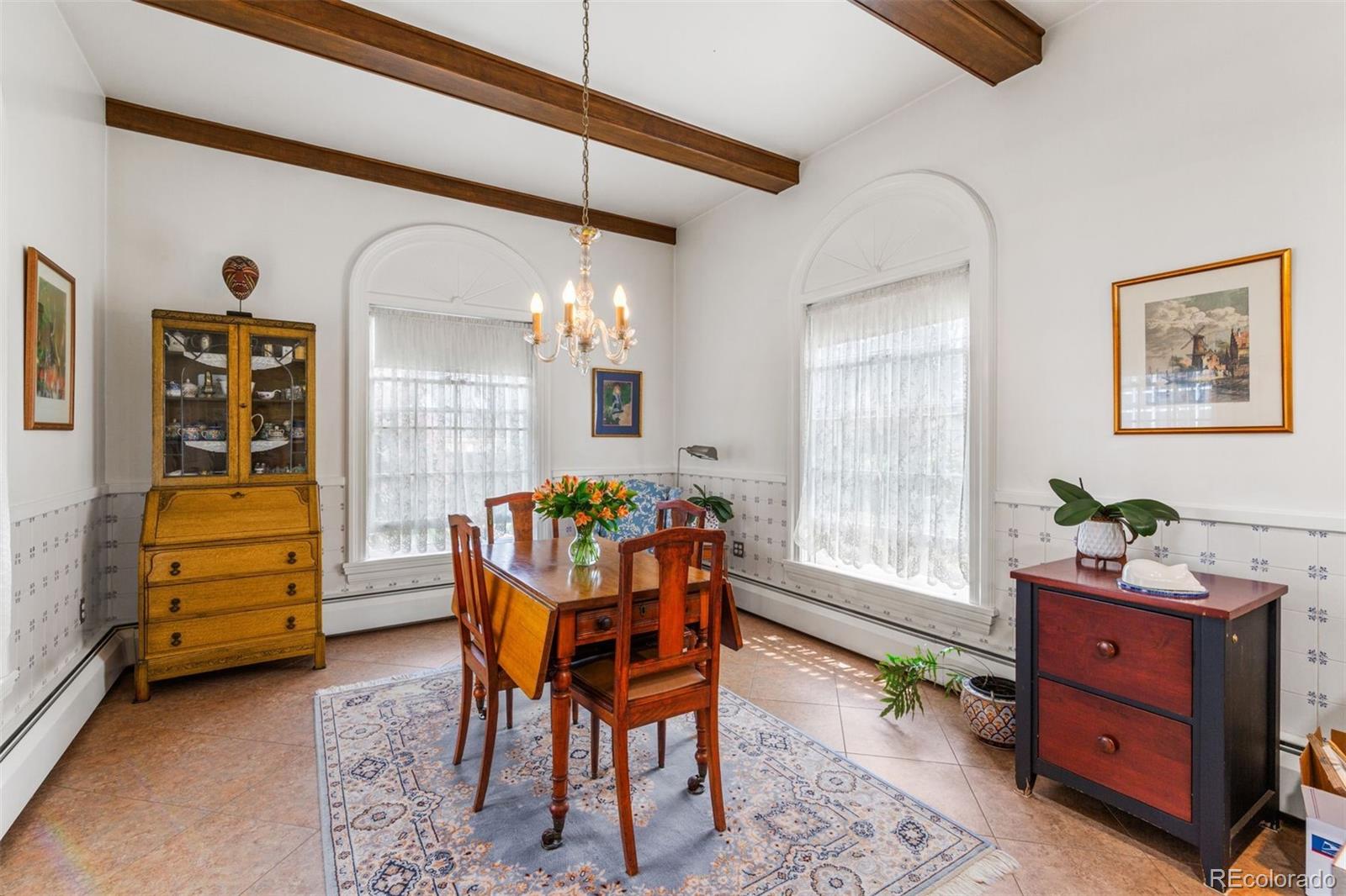 1415 North Cascade Avenue Colorado Springs, CO 80907 - Photo 21 of 48 a dining room with furniture and window