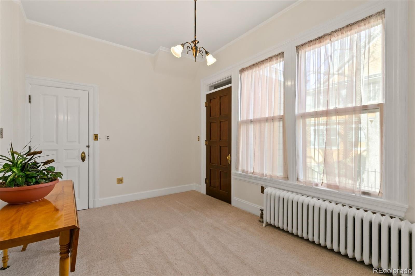 1415 North Cascade Avenue Colorado Springs, CO 80907 - Photo 24 of 48 a view of an empty room with a window