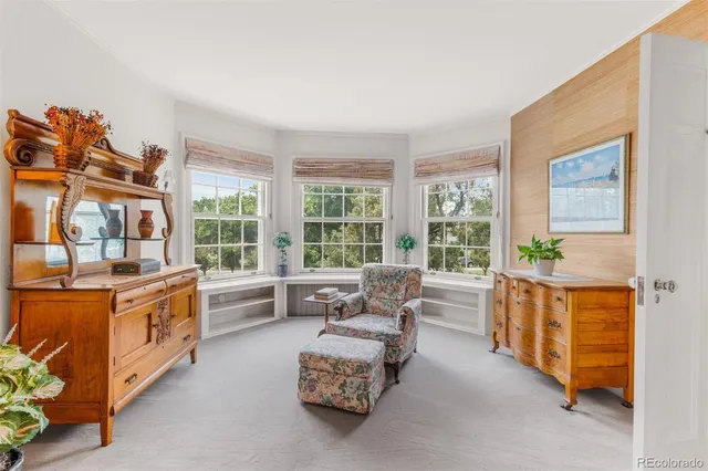 a view of a house with a yard and garage