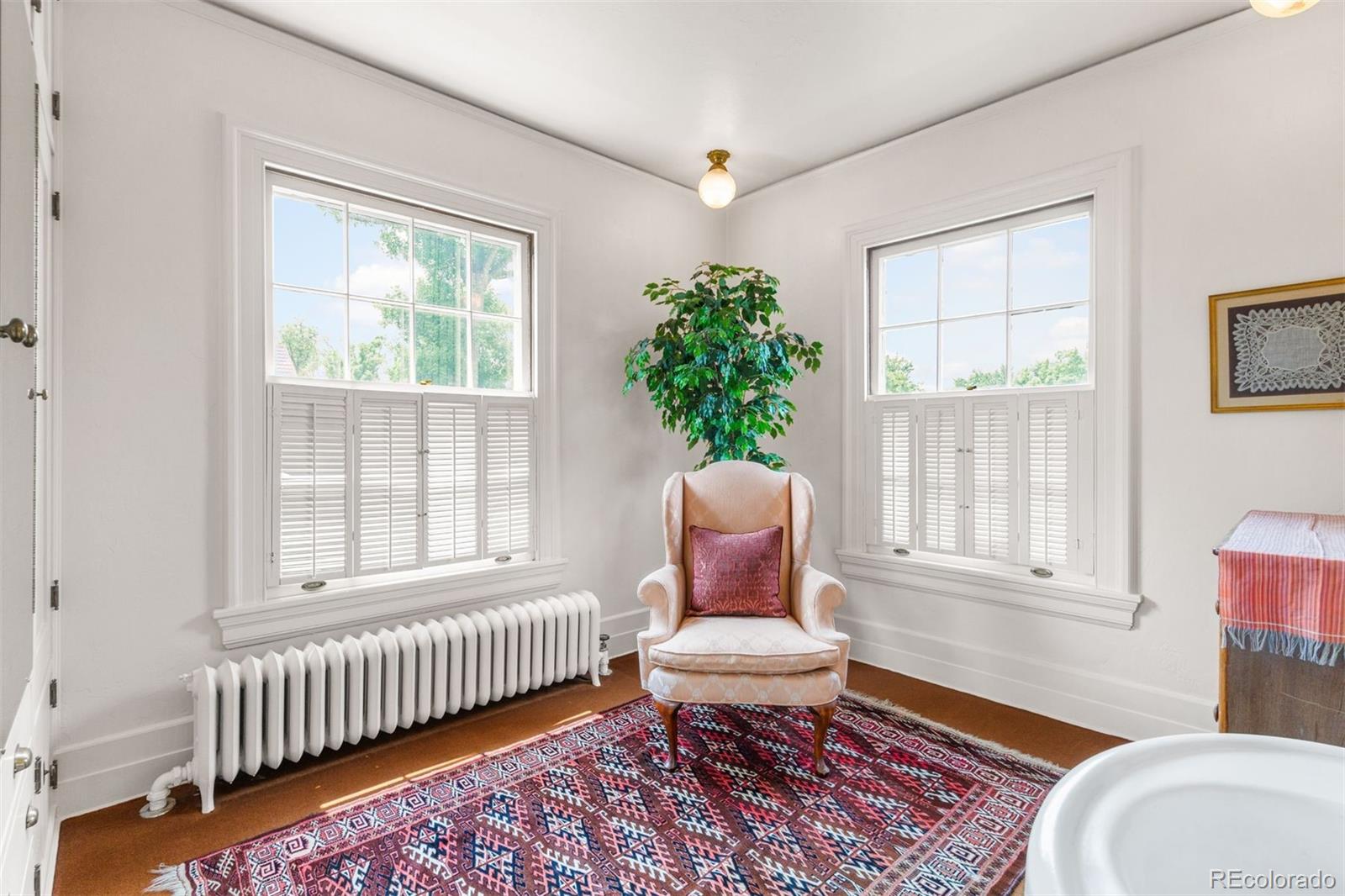 1415 North Cascade Avenue Colorado Springs, CO 80907 - Photo 32 of 48 a living room with furniture and a window