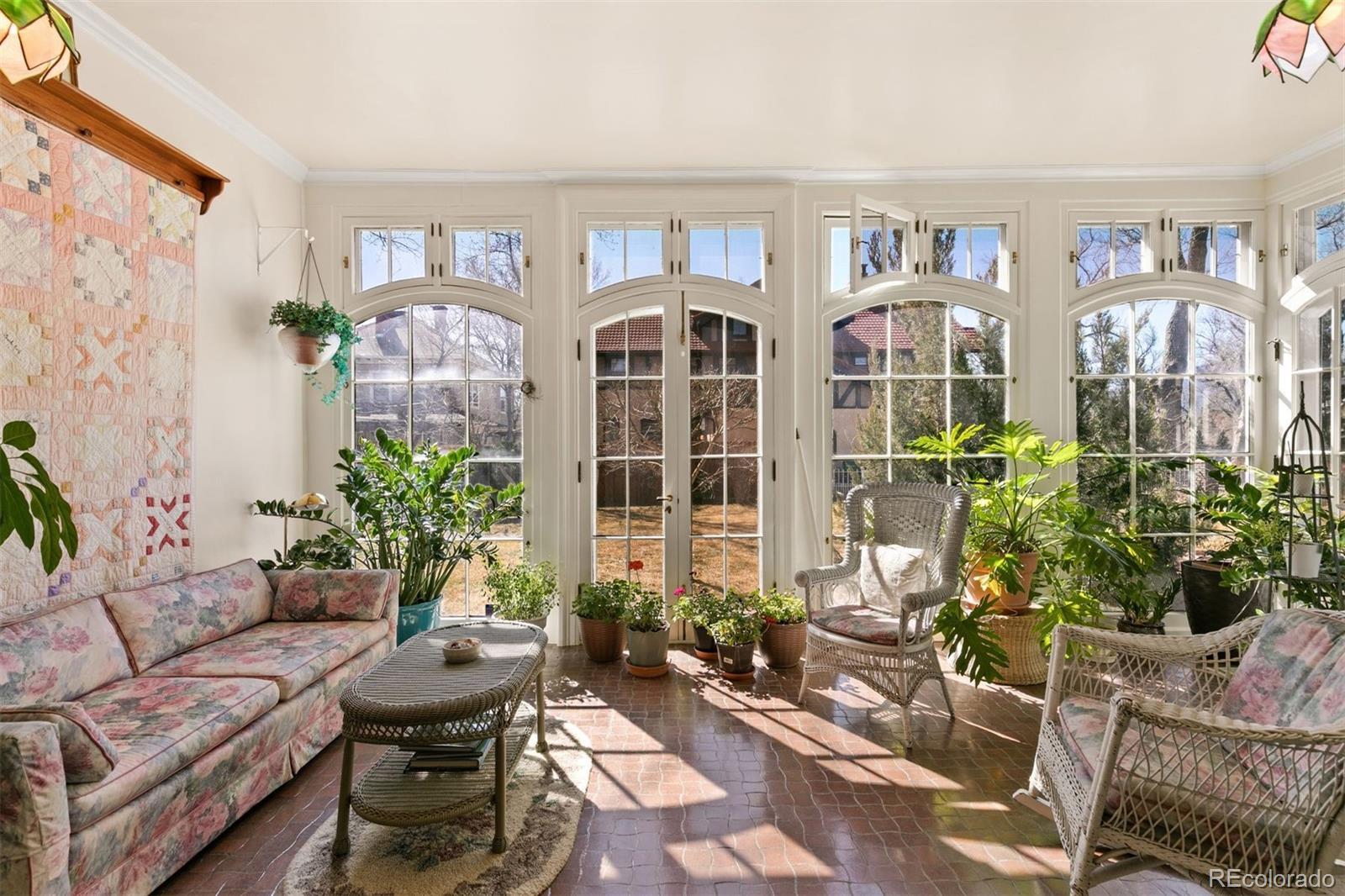 1415 North Cascade Avenue Colorado Springs, CO 80907 - Photo 5 of 48 a living room filled with furniture