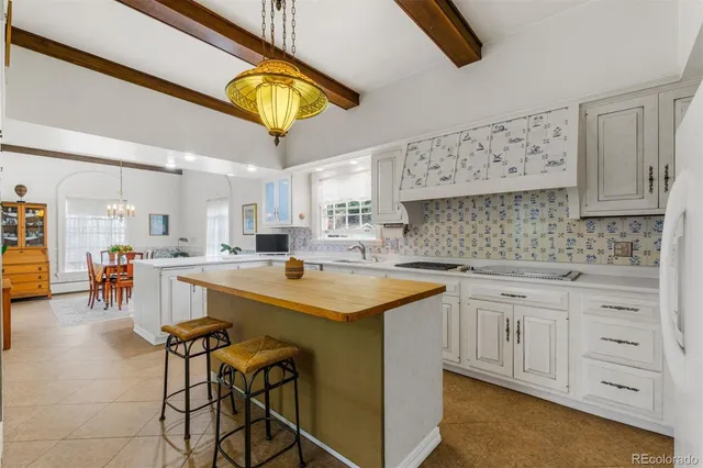 an aerial view of multiple houses with yard