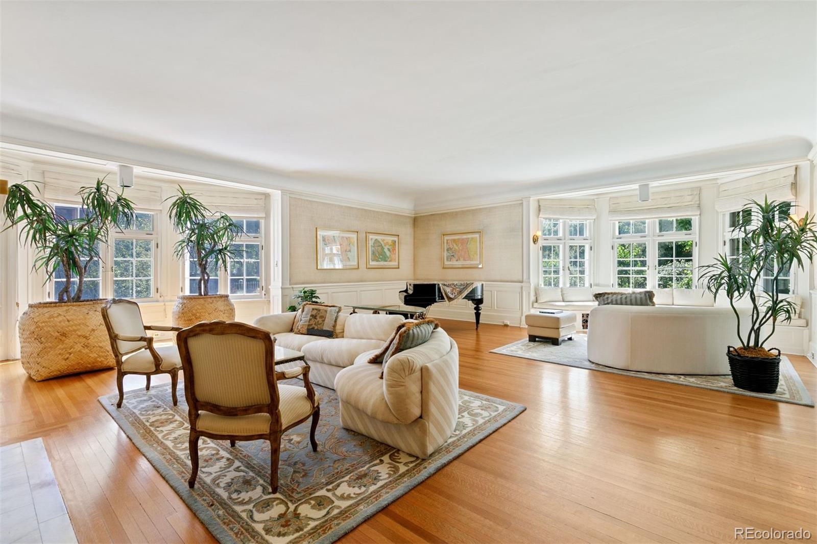 1415 North Cascade Avenue Colorado Springs, CO 80907 - Photo 7 of 48 a living room with furniture and a large window