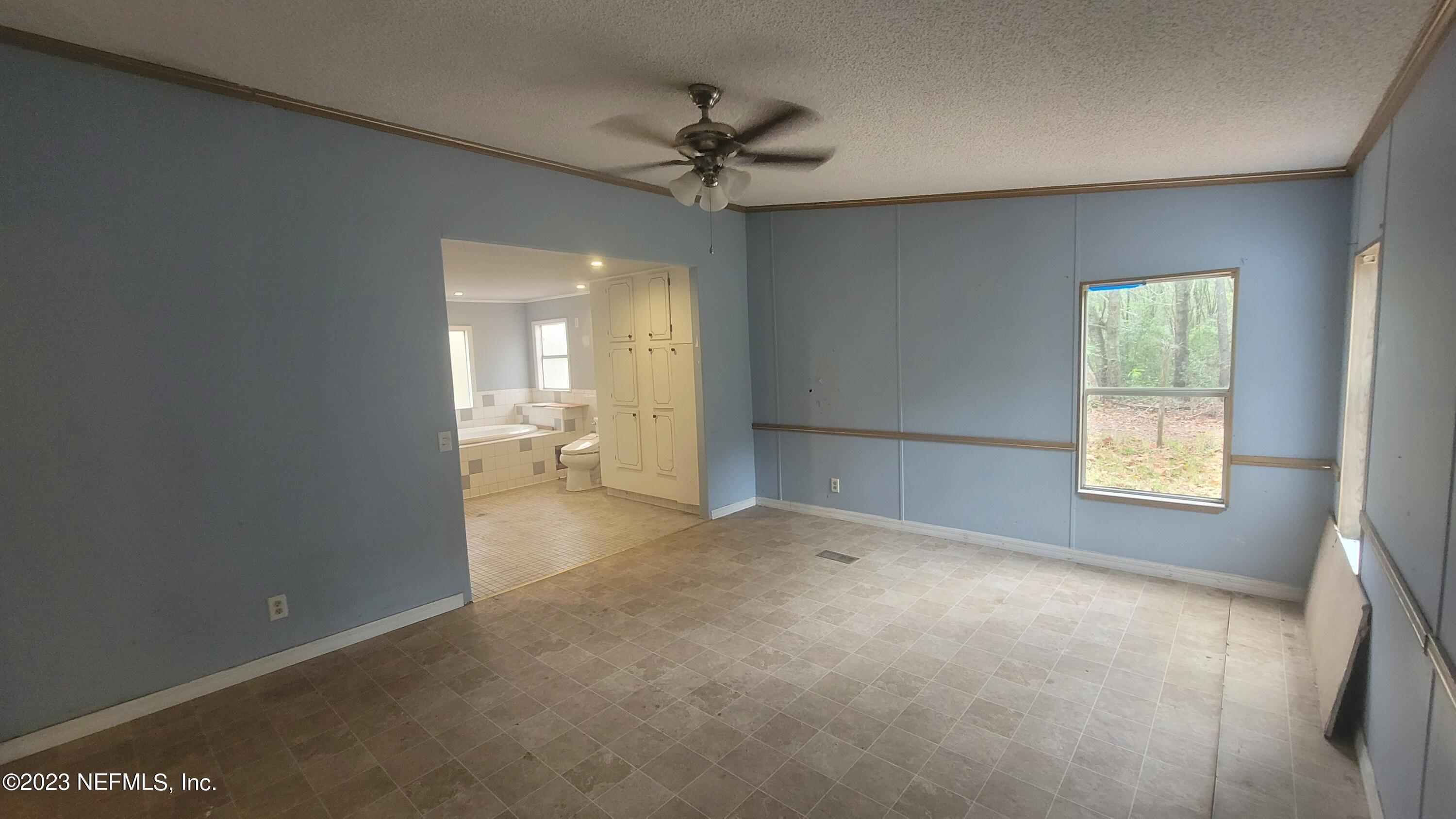 21419 Northwest County 1493 Road Alachua, FL 32615 - Photo 9 of 33 Master Bedroom