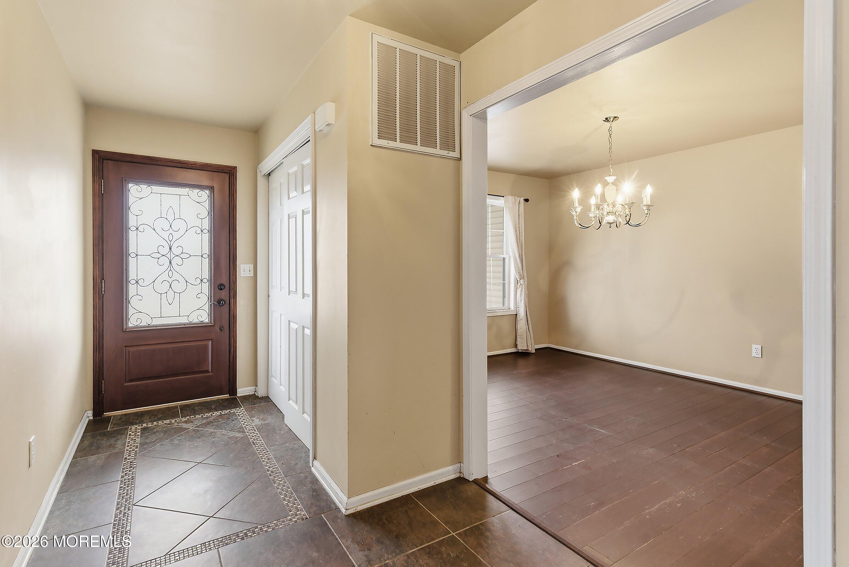 579 Harbor Road Brick, NJ 08724 - Photo 11 of 84 Foyer to dining room