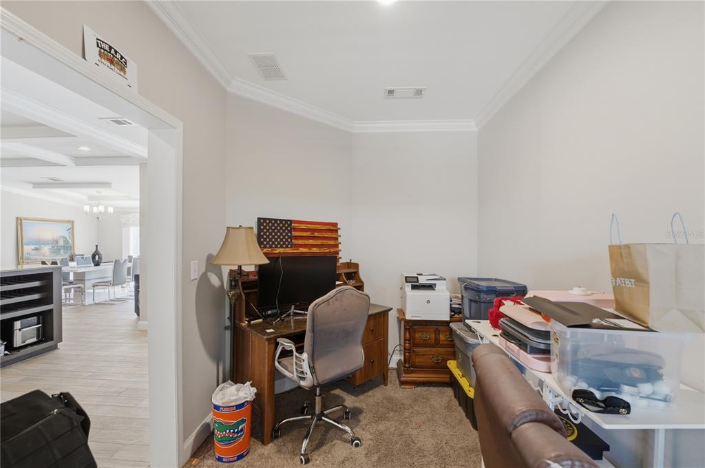 6844 Chad Jason Road St. Cloud, FL 34773 - Photo 35 of 59 a view of a workspace with furniture and toys