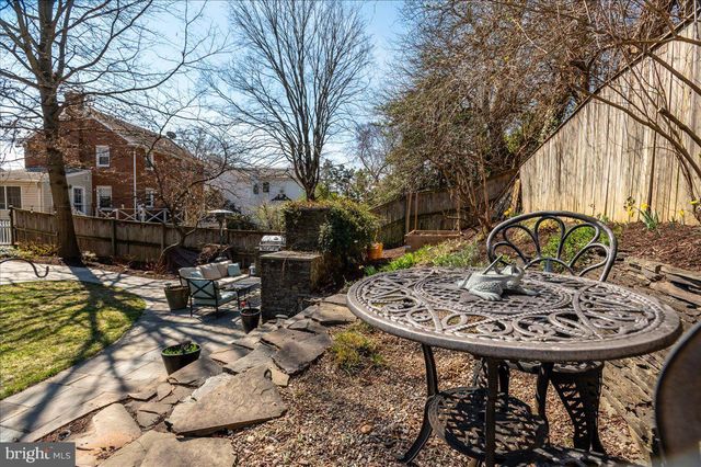 a living room with furniture fireplace and flat screen tv