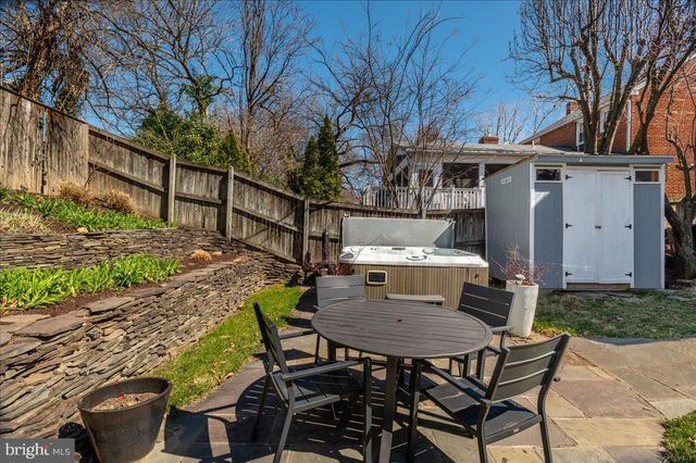 a living room with furniture fireplace and flat screen tv